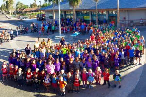 Students at Silver Strand Elementary formed a rainbow of colors representing the Six Pillars of Character.