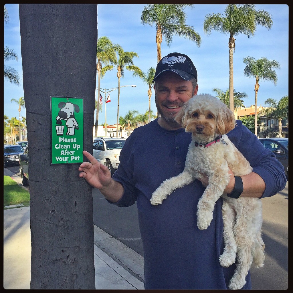 Resident Michael Stellpflug, seen with his dog Lilly, posted two signs outside of his house in hopes that people would start picking up after their dogs. One of the signs was stolen.