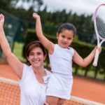 stock-photo-46655592-girl-taking-tennis-lessons