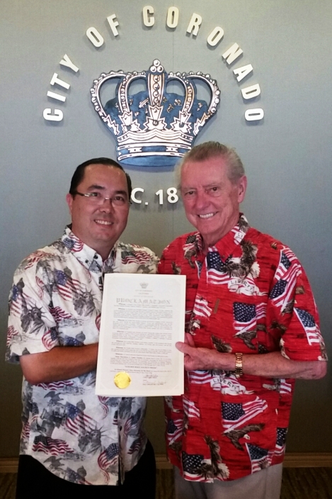 Mayor Tanaka presenting the Proclamation to Len Kaine, President of Coronado's Golden Rule Society