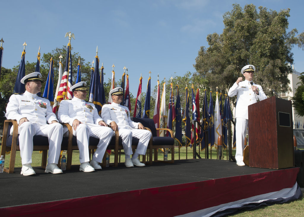 161014-N-KB426-029 CORONADO, Calif. (Oct. 14, 2016) Rear Adm. Brian J. Brakke, commander of Navy Expeditionary Combat Command, and guest speaker, right, speaks to family and friends during Explosive Ordnance Disposal Group OneÕs (EODGRU-1) change of command ceremony aboard Naval Amphibious Base Coronado. EODGRU-1 mans, trains, equips and sustains seven subordinate commands and their 35 EOD platoons and seven MDS companies in support of Northern, Pacific, Africa, Southern and Central Command. U.S. Navy EOD is the worldÕs premier combat force for countering explosive hazards and conducting expeditionary diving and salvage. (Photo by Petty Officer 3rd Class James Vazquez/Released)