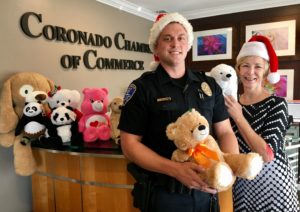 Police Officer and Chamber Executive Director Sue Gillingham with stuffed animals