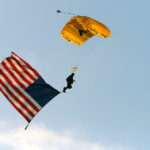 US Navy SEAL Leap Frogs Parachute Team