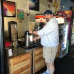 Tom Latona serving coffee at High Tide