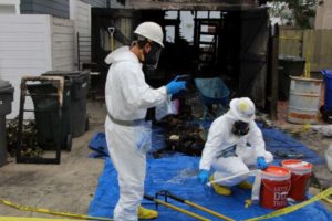 hazardous materials cleanup involving local and federal health officials