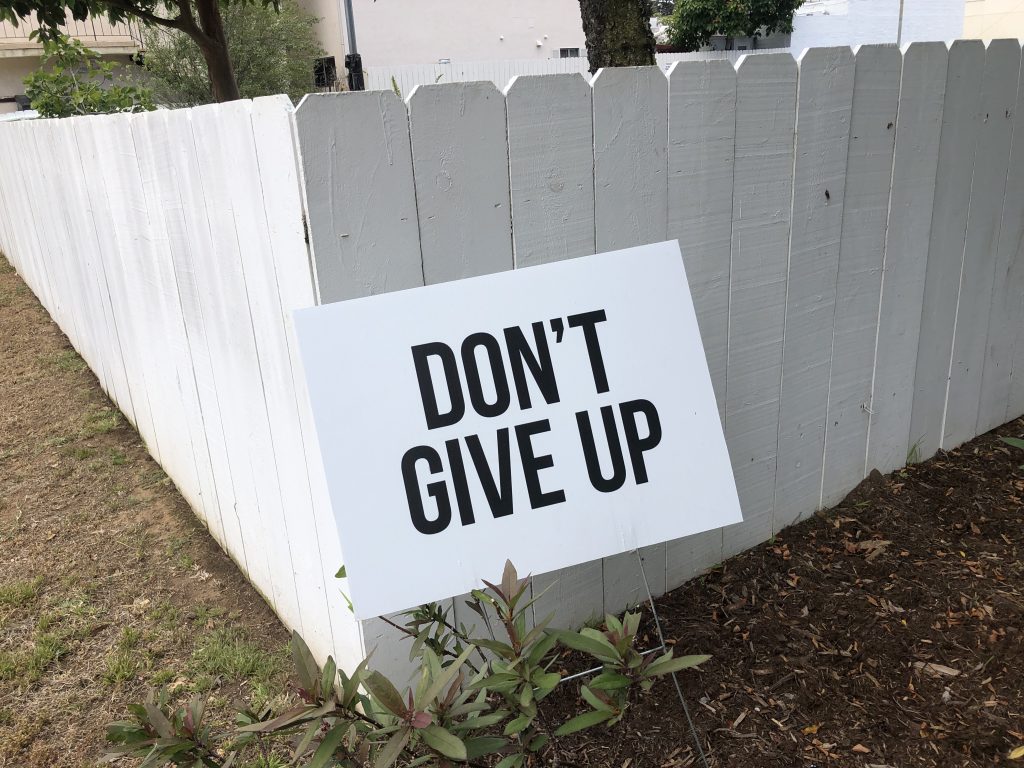 Don't Give Up sign