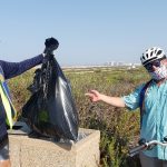 Ivan Dunn and Frank Spitzer with trash from trail