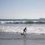 surfing ocean kid