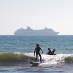 surfing kid ocean cruise ship