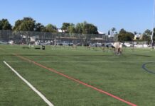 music stands and chairs on cutler field