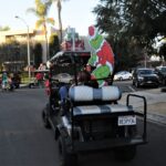 Grinch hitches a ride on a cart