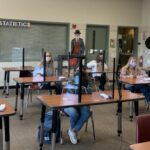 CHS students in class covid pandemic plexiglass school