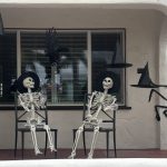 skeletons drinking and laughing