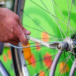 repair fix bike bicycle wheel pexels-julia-schmidt-1154089