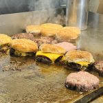 Rocky’s Crown Pub burgers on the grill