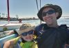 Son and father sailing with the KMAC Foundation.