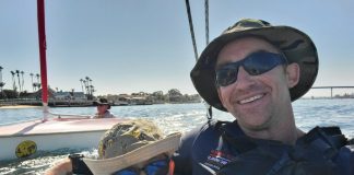 Son and father sailing with the KMAC Foundation.