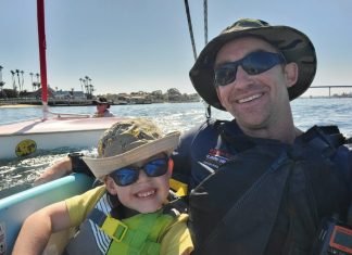 Son and father sailing with the KMAC Foundation.