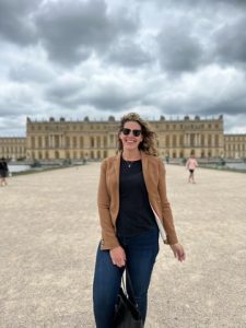 Ashley Warmington in front of the Palace of Versailles. Photo submitted by Ashley Warmington.