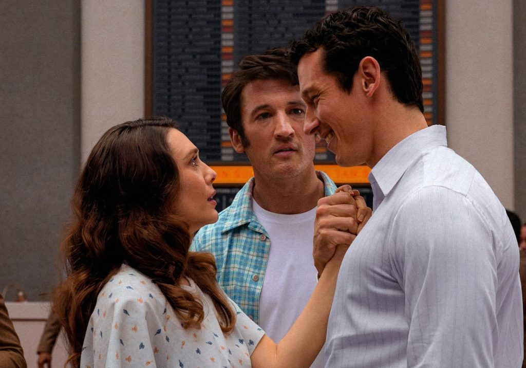 Elizabeth Olsen, Miles Teller, and Callum Turner in Eternity (2025) Elizabeth Olsen, Miles Teller, and Callum Turner in Eternity (2025)