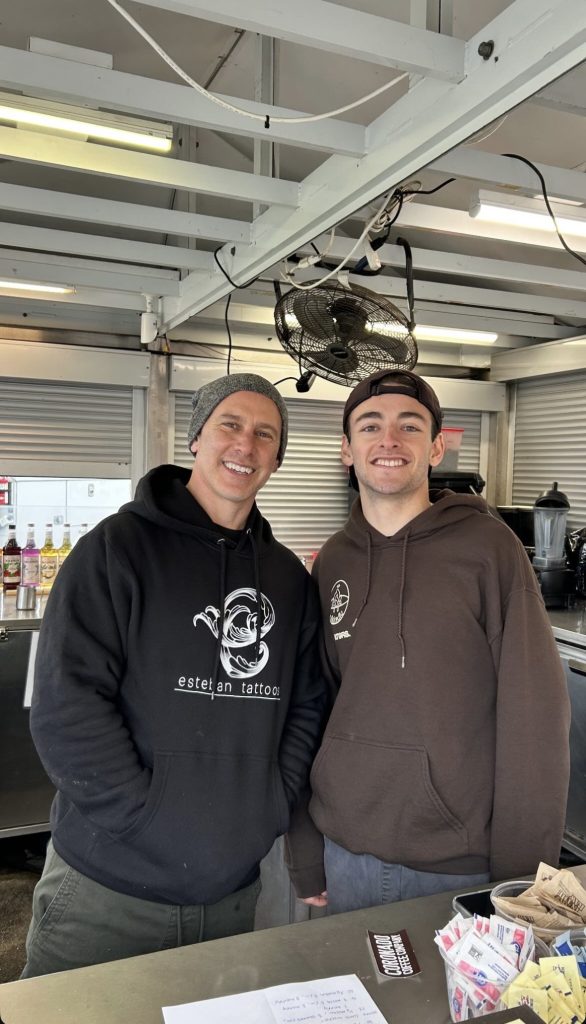 Photo of Luis Madrid with his son, Luis Madrid at Coronado Coffee Company. Luis Madrid thrives in the restaurant industry with quality food and beverages and building genuine connections with his team at Coronado Coffee Company and Lil Piggy's Bar-B-Q.. Photo of Luis Madrid with his son, Luis Madrid at Coronado Coffee Company.