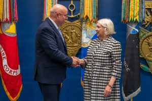 Robert Salesses, Department of War Director of Administration and Management, presents a medallion and certificate to Karol McClelland, President of Coronado Rotary Club, during the 2026 Spirit of Hope (SoH) awards in the Pentagon Hall of Heroes in Arlington, Virginia, Sept. 23, 2026. (U.S. Army photo by Christopher Kaufmann)