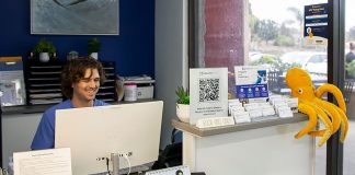 Healthtopia: How a new all-in-one health clinic is bringing integrative primary care to San Diego A Healthtopia clinical care worker at the reception area of integrative primary care in San Diego